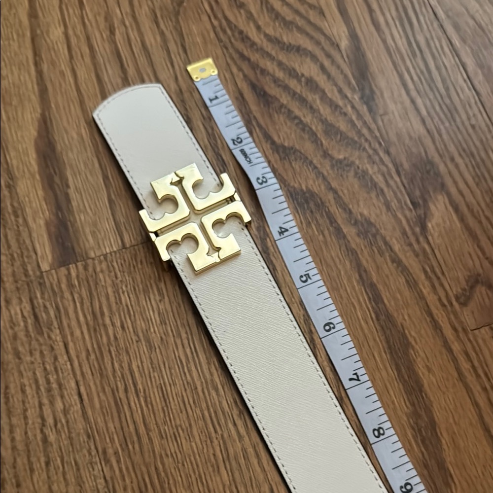 Elegant White Leather Belt with Gold Buckle